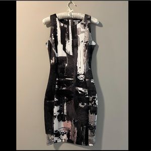 XS dress from H&M. Black, white, grey, pink graphic print. Worn once.
